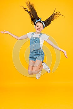 Full of energy. Active girl feel freedom. Fun and relax. feeling free. carefree kid on summer holiday. time for fun