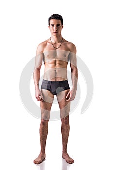 Full figure of fit young man in underwear isolated
