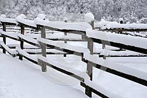 Full filled snowy horse corral at abandoned ranch