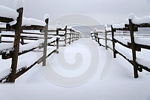 Full filled snowy winter ranch without horses rural scene