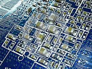 Full focus circuit board with microchips and other electronic components. Computer and networking communication technology