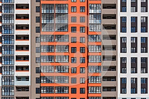 full frame background of new high rise apartament building wall with multiple balcony and windows photo