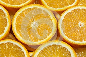 Full frame background with orange slices. Cross section of orange fruit