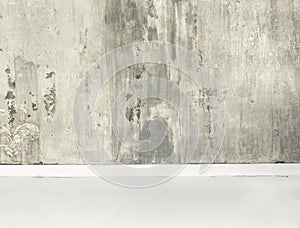 Full frame background texture of a grunge stained gray wall