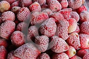 a full frame of frozen strawberries