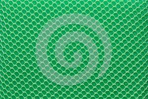 Full frame green hexagon mesh pattern background