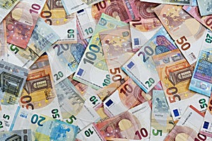 Full frame money background with a lot of different euro banknotes, finance and business concept, high angle view from above