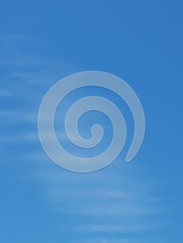 Full frame of pretty blue sky with unusual scudding cloud formation