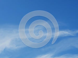 Full frame of pretty blue sky with unusual scudding cloud formation