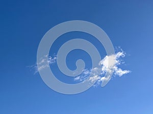 Full frame of pretty blue sky with unusual scudding cloud formation