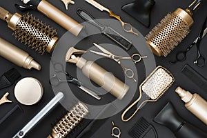 Full frame of professional hair dresser tools on black background