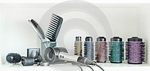 Full frame of professional hairdresser tools on white background.