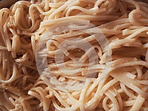 Full frame shot of delicious healthy homemade noodles (taglierini) pasta. Good as a background.