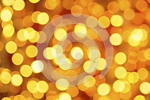 Full frame shot of golden defocused lights on red backgroound