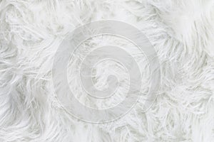 Full frame of soft fake white fur rug