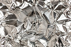 Full frame take of a sheeT of crumpled silver aluminum foil
