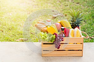 Full fresh vegetables and fruits in crate wood box