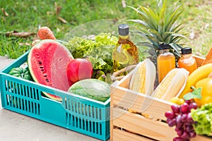 Full fresh vegetables and fruits in crate wood box