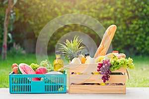 Full fresh vegetables and fruits in crate wood box