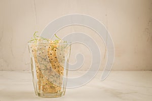 full glass of currant/full glass of currant on a white background, selective focus and copy space