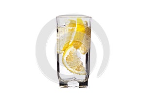 Full glass of water with lemon isolated on white