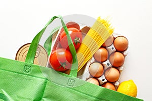 Full green bag of healthy products food on a white background. Top view. online shop. your text. food delivery