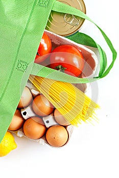 Full green bag of healthy products food on a white background. Top view. online shop. your text. food delivery