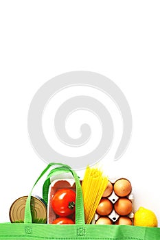 Full green bag of healthy products food on a white background. Top view. online shop. your text. food delivery