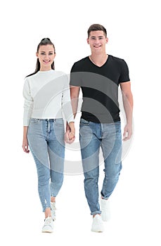 In full growth. casual young couple walking together
