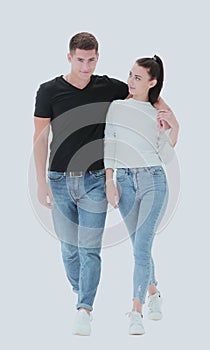 In full growth. casual young couple walking together