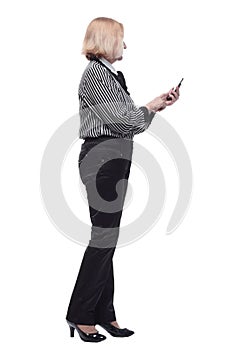 in full growth. Executive business woman with a smartphone.