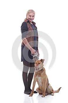 In full growth. female dog handler with a pet dog.