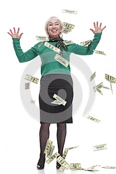 in full growth.happy woman with dollar bills.