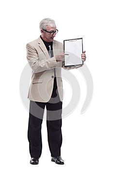 in full growth. Mature intelligent man with a clipboard.