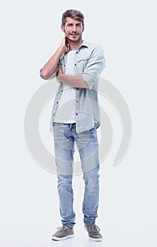 In full growth. modern young man in jeans