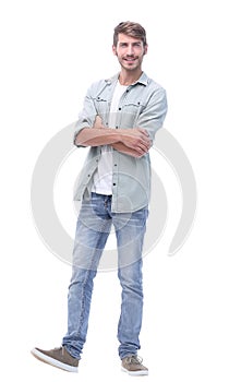 In full growth. smiling young man in jeans