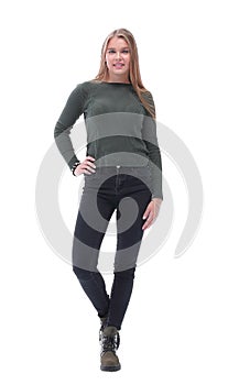 In full growth. stylish young woman in gray longsleeve and jeans.