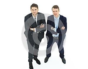 In full growth.two serious business partners standing,isolated on white background.