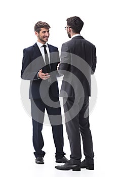In full growth. two young businessmen discussing something