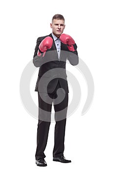 in full growth. young businessman in Boxing gloves.