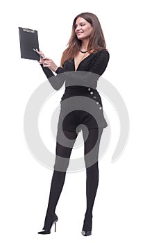 In full growth. young woman pointing to a blank space in the clipboard.