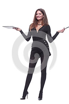 in full growth. young woman pointing to a blank space in the clipboard.