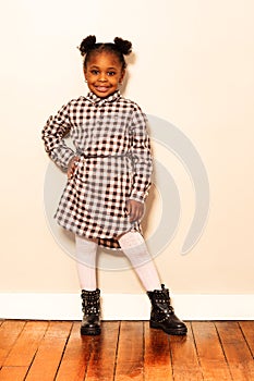 Full height portrait of beautiful small black girl