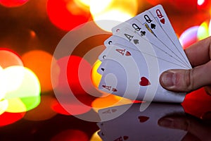 Full house poker cards combination on blurred background casino luck fortune card game
