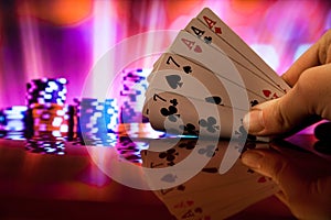 Full house poker cards combination on blurred background casino luck fortune