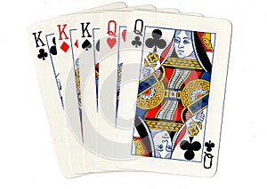 A full house poker hand of playing cards.