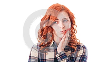 Full isolated picture from young woman with toothache with red spot.