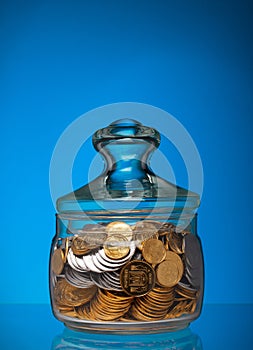 Full jar with coins