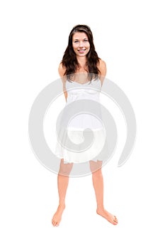 Full leght portrait of a beautifu young womanl wearing a short summer skirt tank top and sunglasses