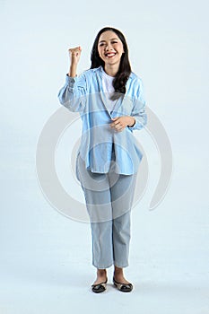 full leght shoot of happy asian Indonesian woman wearing casual attire on isolated background
